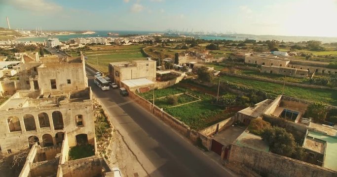 Aerial Shot - Craning Up from a house to a City by the Sea