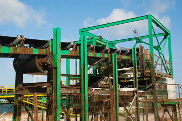 Old equipment for transportation and distribution salt. Industrial elevator.