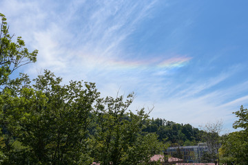 Horizontal rainbow (rounded-horizontal arc). Rare natural phenomenon.