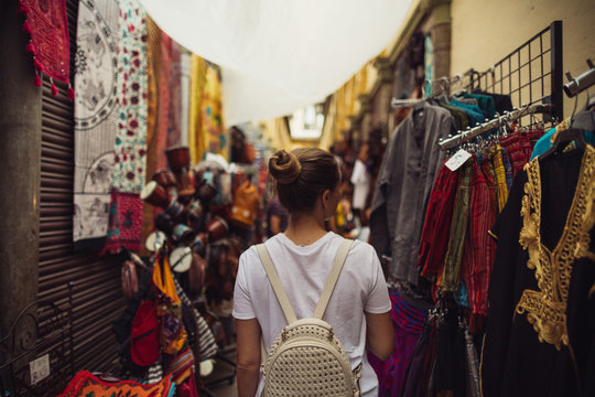 Woman doing tourism with map at Granada, Spain.