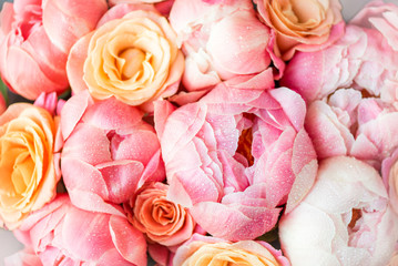 Fresh bunch of pink peonies and roses