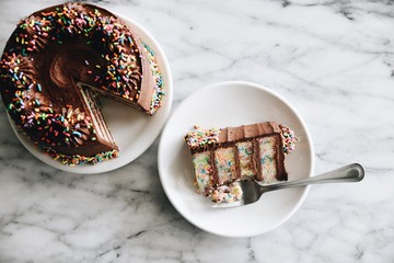 Confetti cake with chocolate frosting and sprinkles