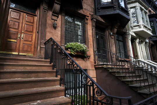 steps leading up to a brownstone building
