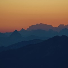 Fototapeta na wymiar Sunrise view from Mount Brienzer Rothorn, Switzerland. Golden morning sky.