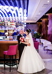 Sweet couple hugging each other in a restaurant