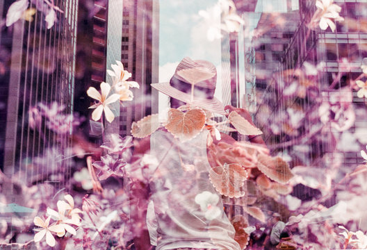 Young girl with hat walking through flower-filled street in New York City
