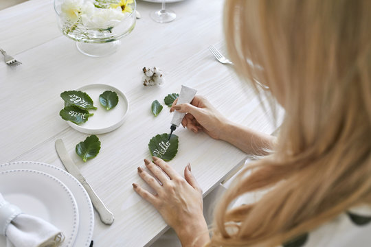 Woman Decorating Table