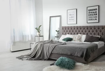 Foto op Aluminium Elegant room interior with large comfortable bed © New Africa