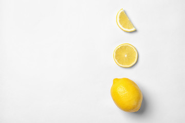 Beautiful composition with lemons on white background