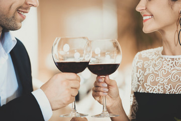 Young Couple in Love Drinking Wine Clink Glasses