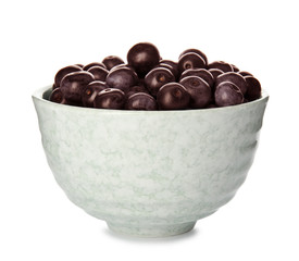 Bowl with fresh acai berries on white background