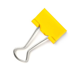 Colorful binder clip on white background. School stationery