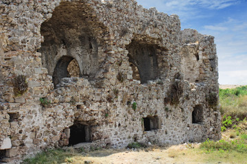 Fototapeta na wymiar Ancient Side. Turkey. Ruins of the ancient city. Hospital. Ruins of building
