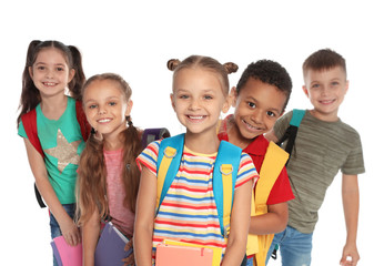 Group of little children with backpacks and school supplies on white background - Powered by Adobe