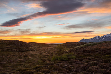 The sunset is reflected in the clouds