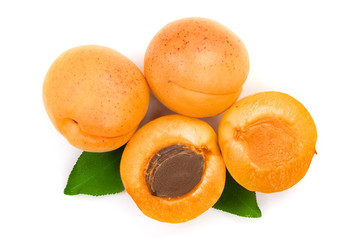 Apricot fruits with leaves isolated on white background macro