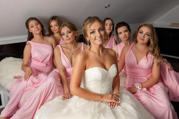 Obraz premium Wedding. Bride and bridesmaids at wedding day