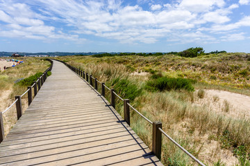 Fototapeta na wymiar Walkway to White Sand Beach, in Sao Martinho do Porto, Portugal