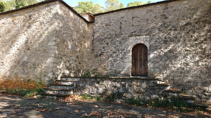 Fototapeta na wymiar Austere Windowless Monastery Walls - Ioannina Island, Greece