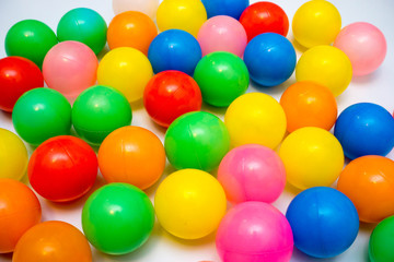 Fototapeta na wymiar colorful plastic balls on a white background