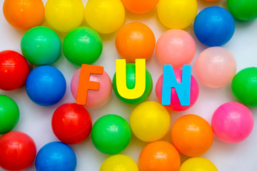 colorful plastic balls on a white background