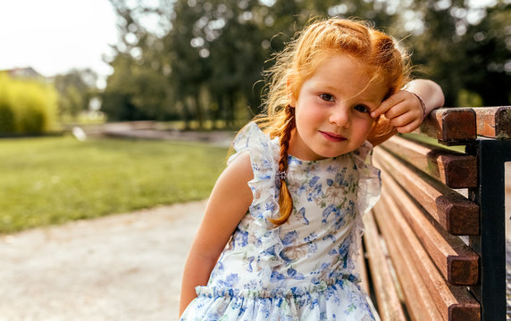 Portrait of a little redheaded girl
