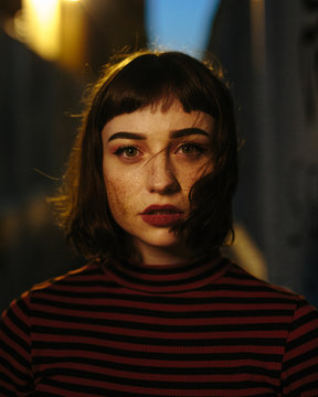 Woman with dirty cheek