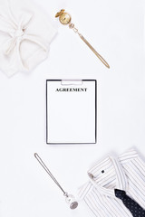 Flat lay of business or office formal suits. Male and female clothes.