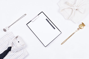 Flat lay of business or office formal suits. Male and female clothes.