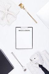 Flat lay of business or office formal suits. Male and female clothes.