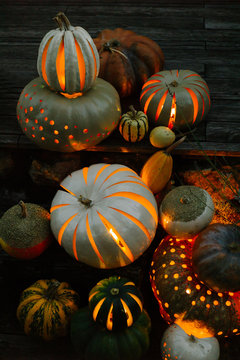 Carved pumpkins glowing in night