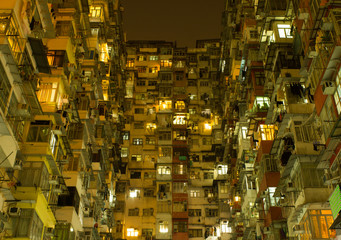 Old apartment buildings stacked together, long exposure at night