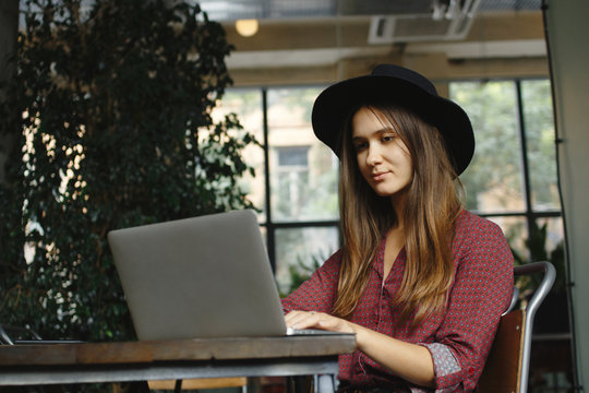 Young woman working with laptop