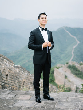 Stylish groom in suit