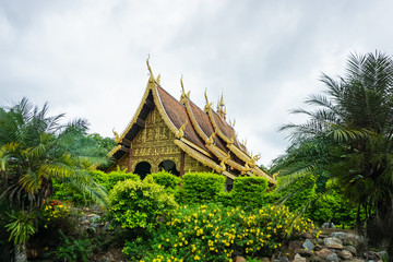 Chapel of the Teak Wood Lanna architecture. Phra That Pha Ngao (Shadow) Temple Located in Chiang Rai, Thailand.