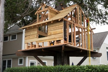 Tree house being built in backyard