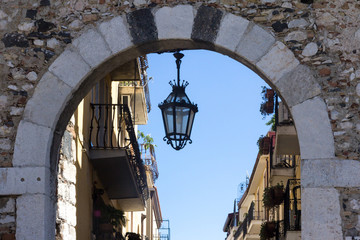 Hanging lamp in archway,
