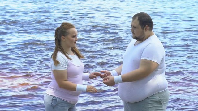 Break-up Of Overweight Couple, Obese Female Leaving Boyfriend And Walking Away