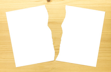White Ripped Paper or Torn Paper in Half on Wood Background 2