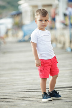 Fashionable child by the sea

