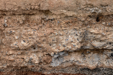 Gravel section with concrete under the road.