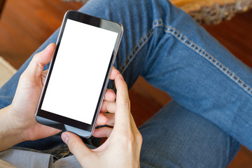 man using mobile smart phone in living room