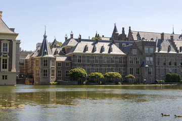 The Hague, Netherlands - July 03, 2018: View of the Binnenhof from the palace pond.