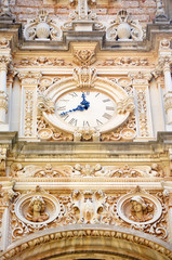 Clock on the Facade of Santa Maria de Montserrat Abbey in Spain