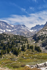 Fototapeta premium Wind River Range, Rocky Mountains, Wyoming, views from backpacking hiking trail to Titcomb Basin from Elkhart Park Trailhead going past Hobbs, Seneca, Island, Upper and Lower Jean Lakes as well as Pho