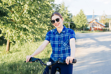 Young woman riding a bike