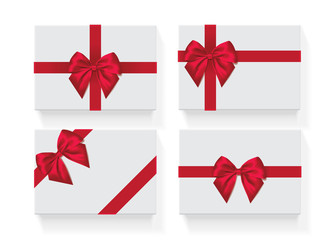rectangular white box with a red bow 