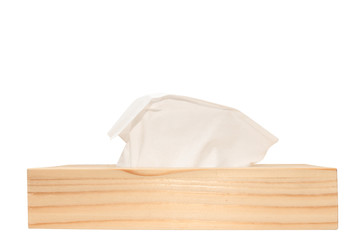 Napkin in the wooden box isolated on white background.