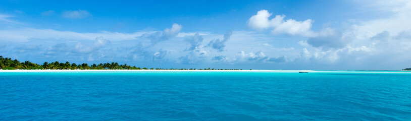 Fototapeta na wymiar Maldives beach resort panoramic landscape. Summer vacation travel holiday background concept. Maldives paradise beach.