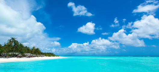 Obraz na płótnie Canvas Maldives beach resort panoramic landscape. Summer vacation travel holiday background concept. Maldives paradise beach.